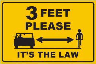 A three foot distance must be present between the passing automobile and slower traveling bicyclists.